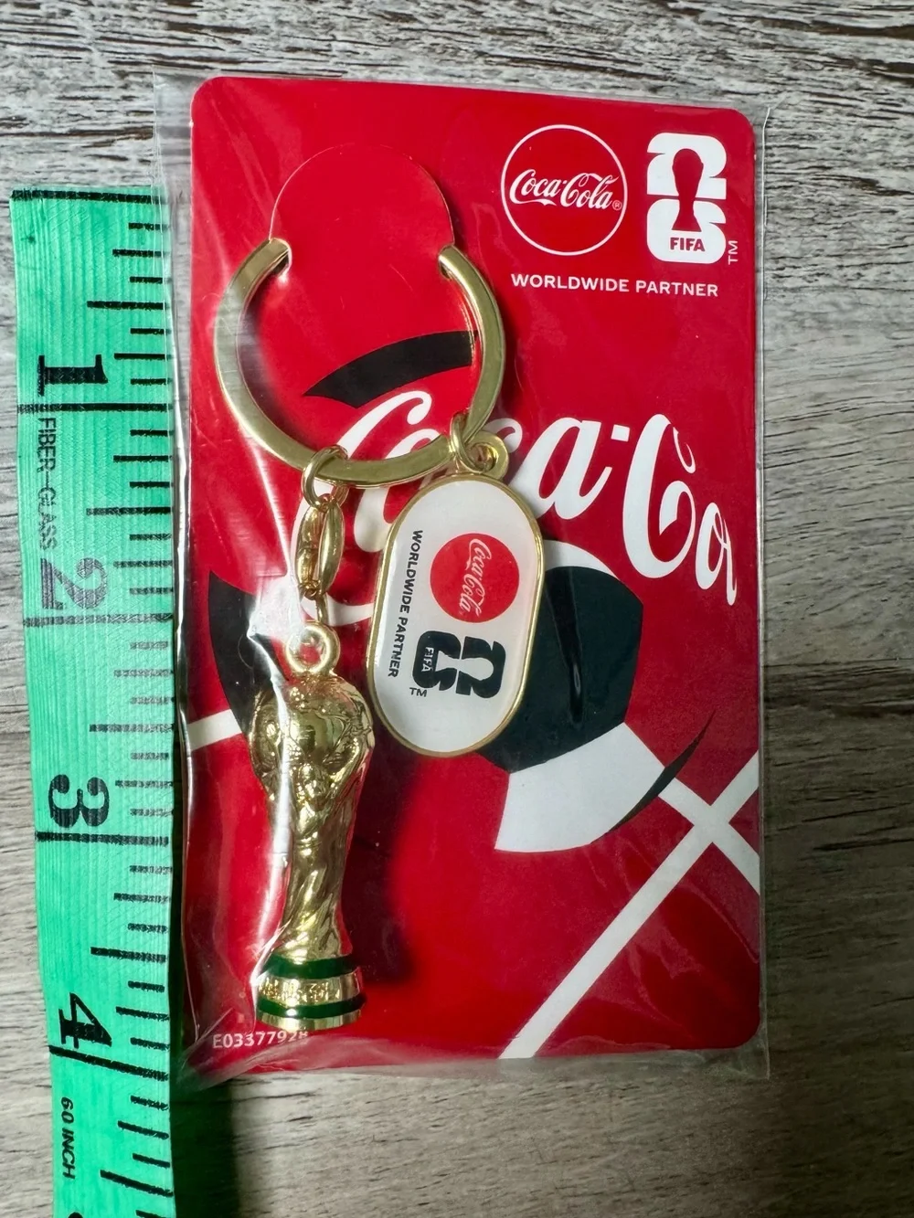 Coca-Cola FIFA World Cup Trophy Tour 2026. This Coca-Cola souvenir keychain,